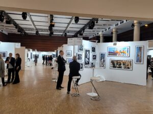Exhibition booths at Art Shopping Paris 2023, held at the Carrousel du Louvre in Paris, France. International galleries presented contemporary artworks in a professional fair environment.